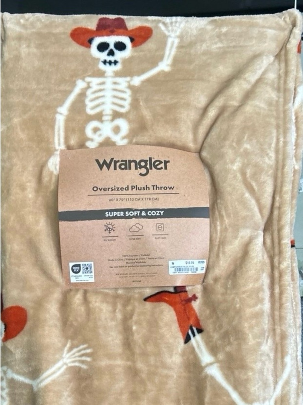Wrangler Skeleton Throw Blanket in Tan with Orange Accents
